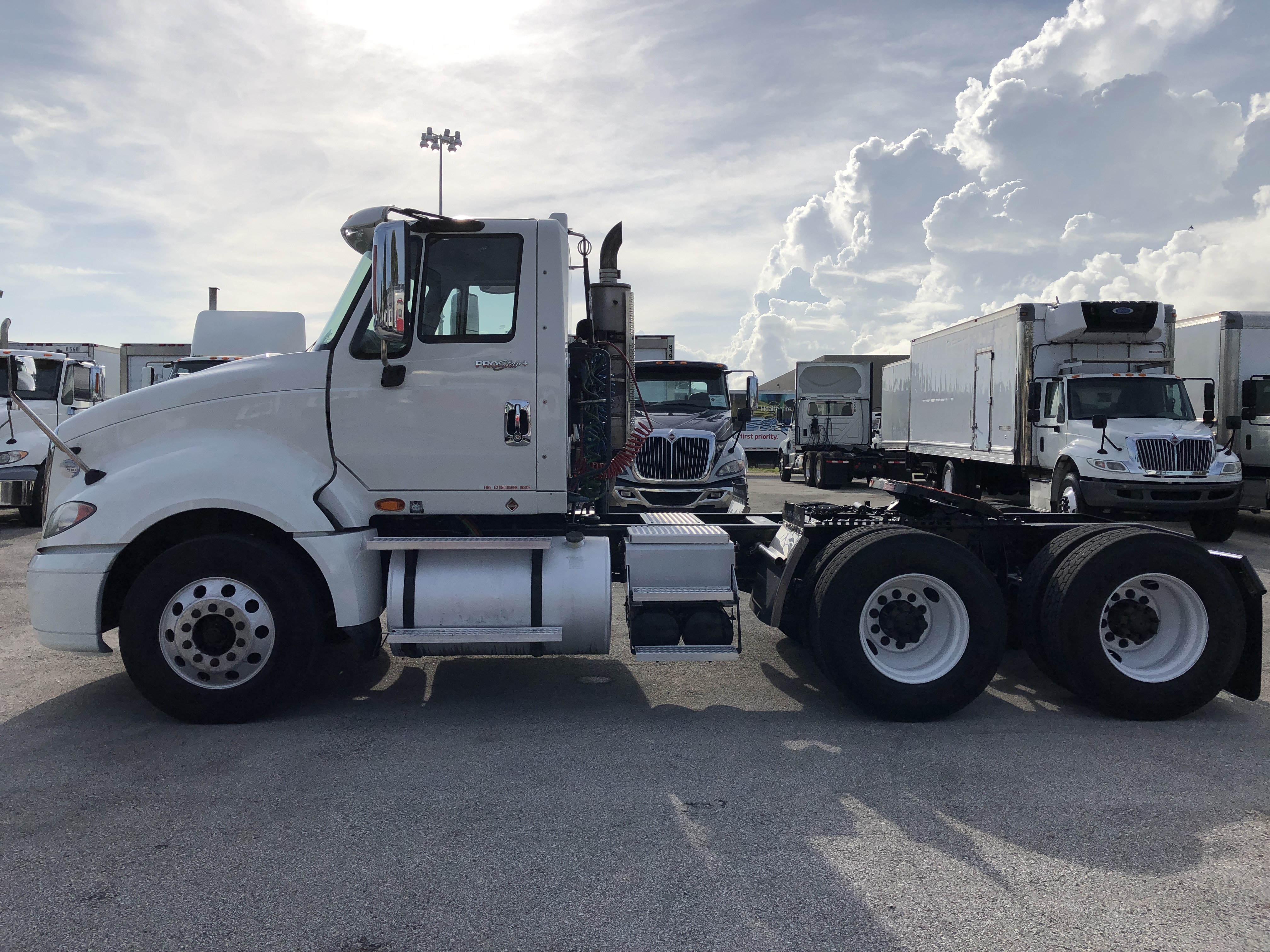 Pre-owned 2013 International Prostar 6x4 Tandem Axle Day Cab Tractor 